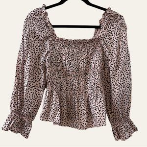 Balloon sleeve smocked peplum top